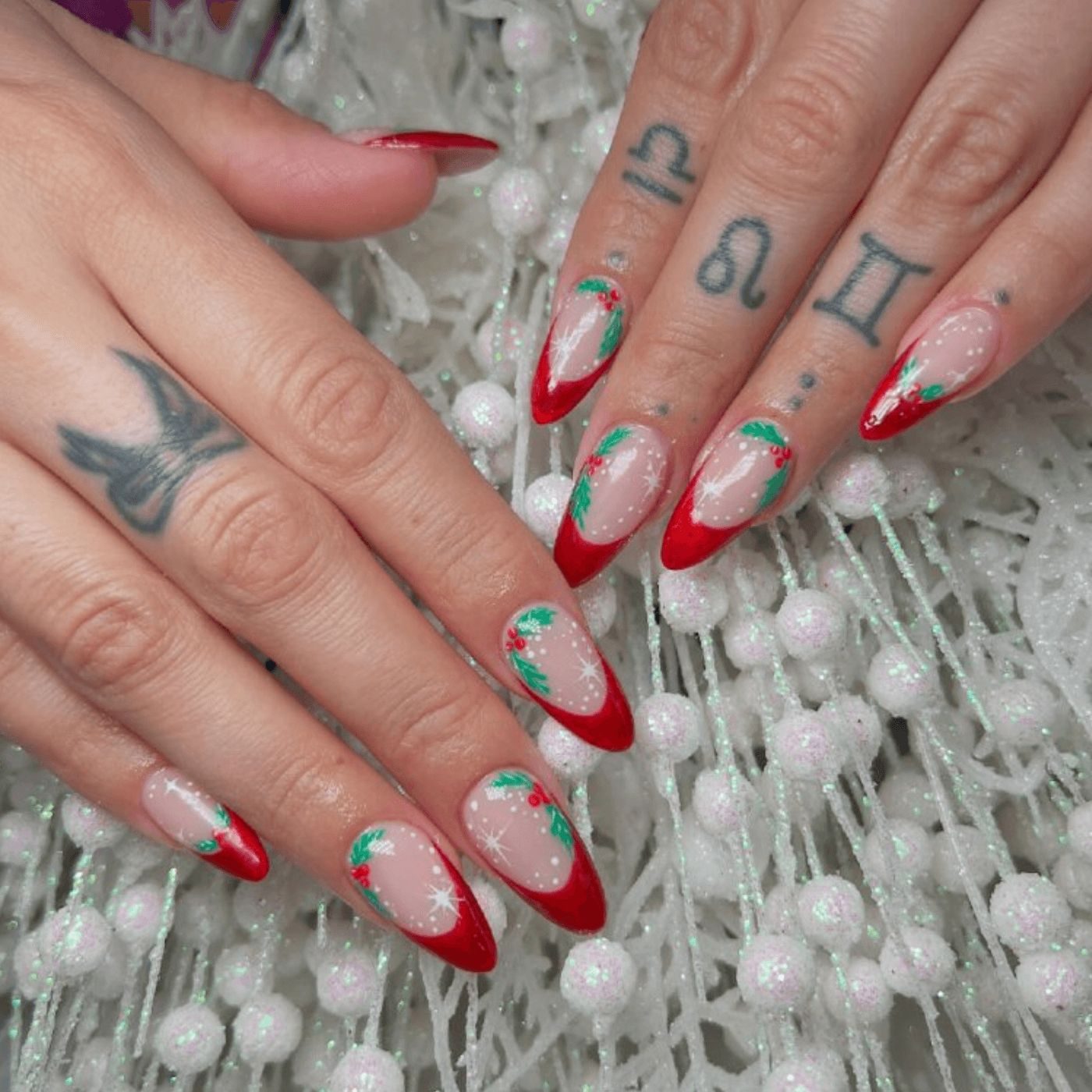 Medium Stiletto Red French with Holly Snowflakes Medium Stiletto Red French with Holly Snowflakes — Red Christmas Nails 2026