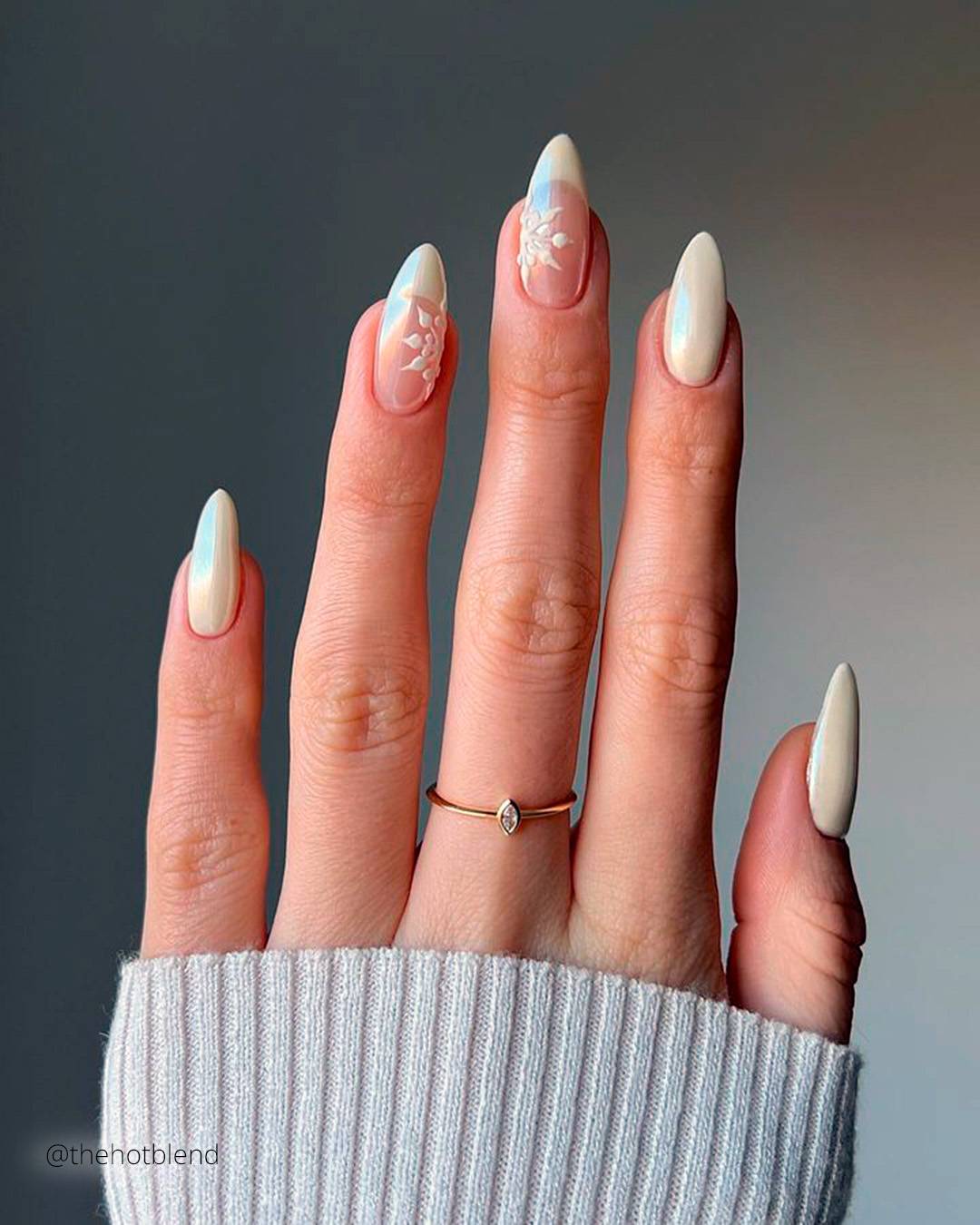Pale Cream Shimmer with Floral Art Pale Cream Shimmer with Floral Art — Winter Nail Colors for Women Over 70
