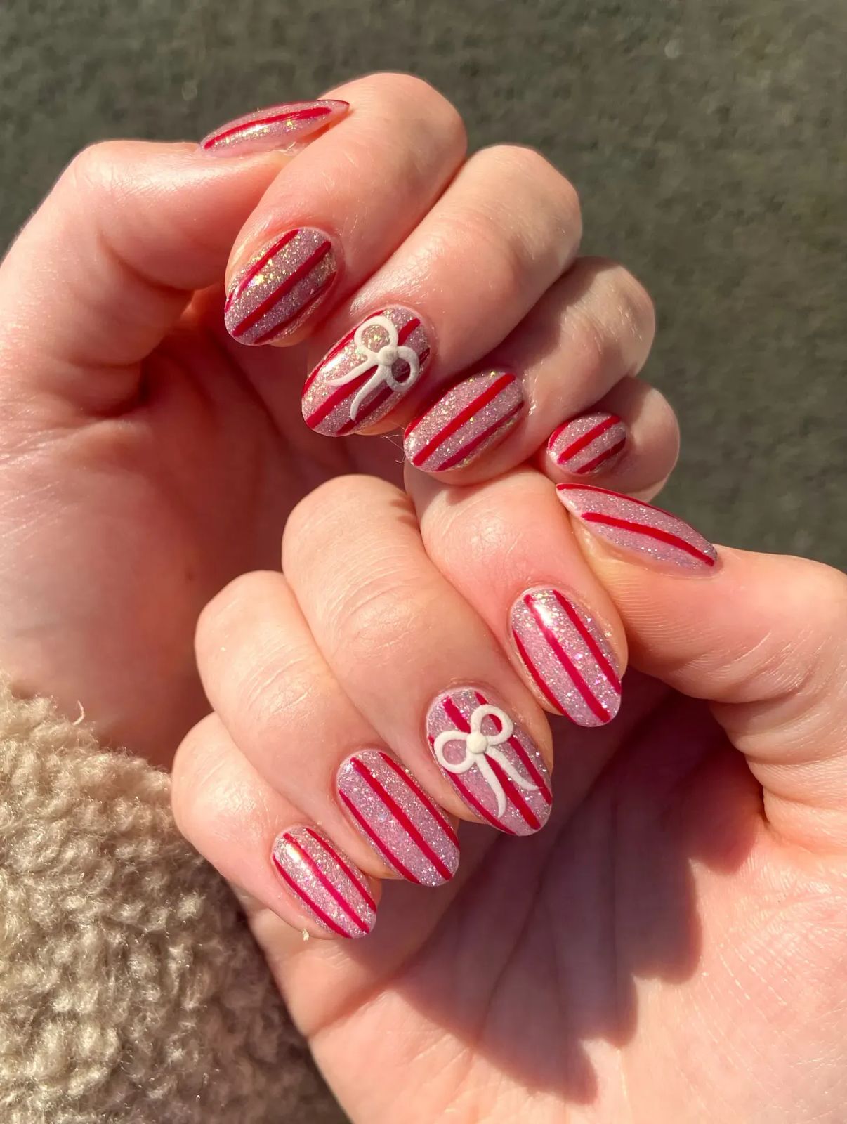 Red White Glitter Pink Stripe Bow Nails Red White Glitter Pink Stripe Bow Nails — Cute Christmas Nails 2026