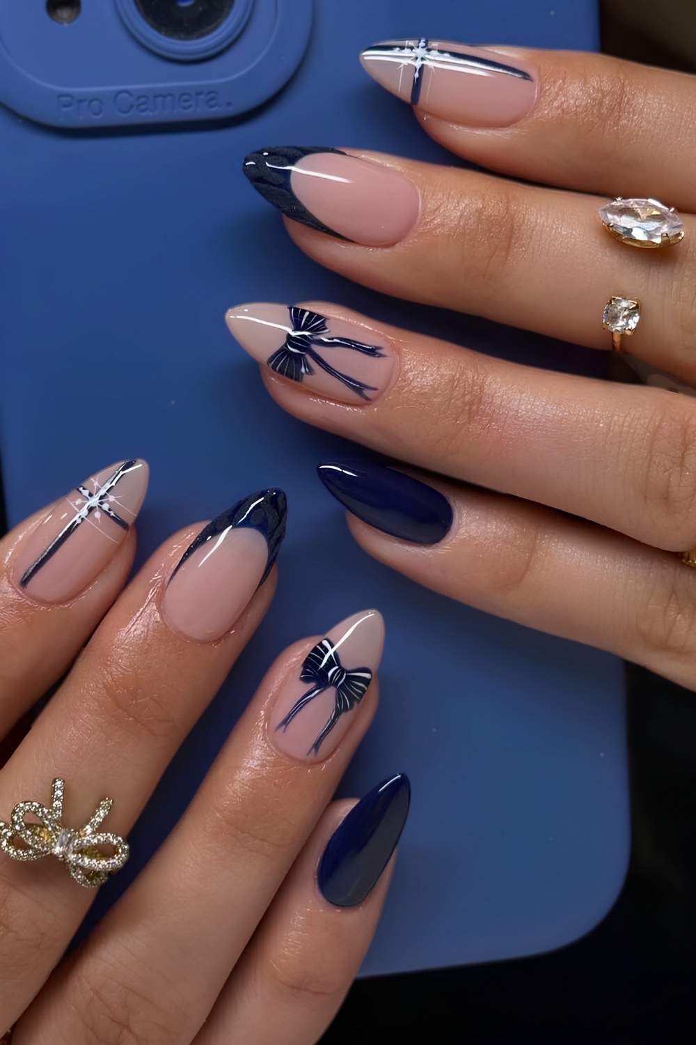 Navy Bow Sheer Pink Almond Nails Navy Bow Sheer Pink Almond Nails — Holiday Party Nails 2026