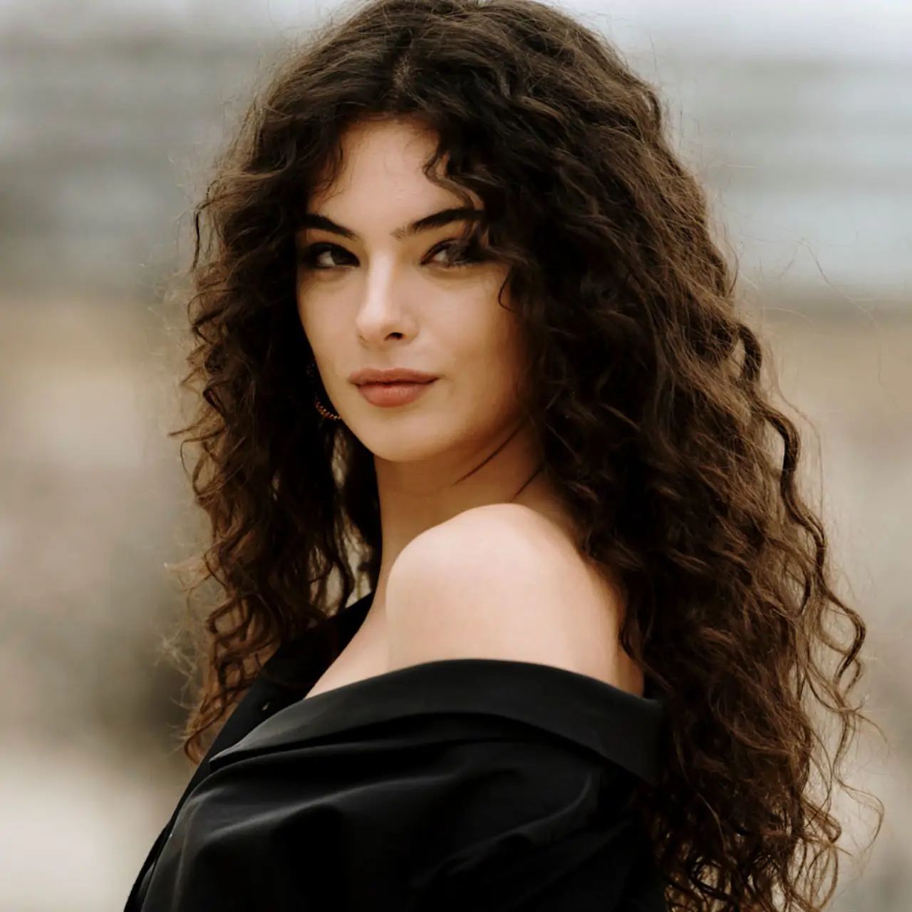 Voluminous Mid-Back Curls Voluminous Mid-Back Curls — Winter Hairstyles for Curly Hair
