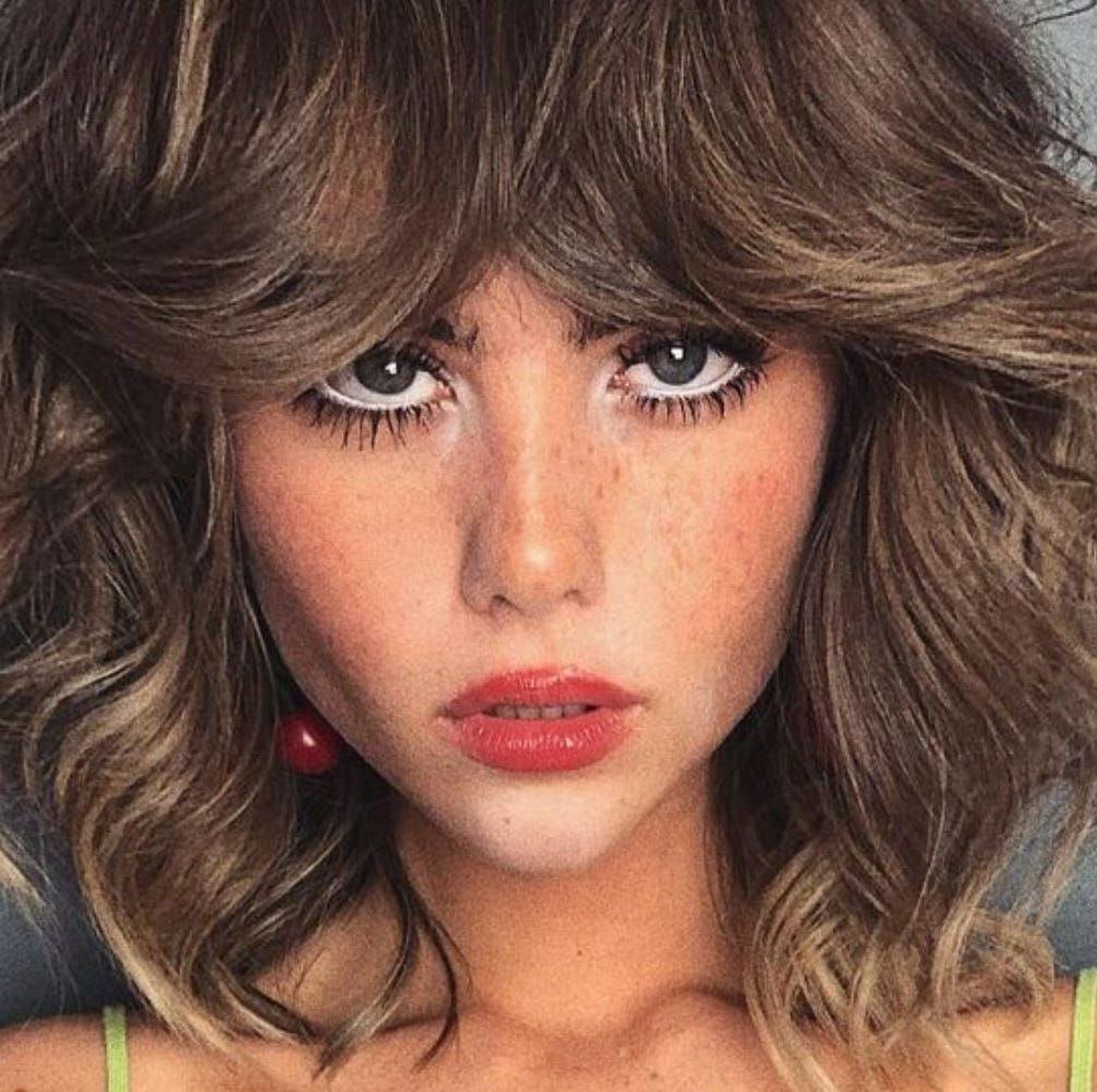 Textured Shag With Full Bangs Textured Shag With Full Bangs — Winter Haircuts for Heart Shaped Faces