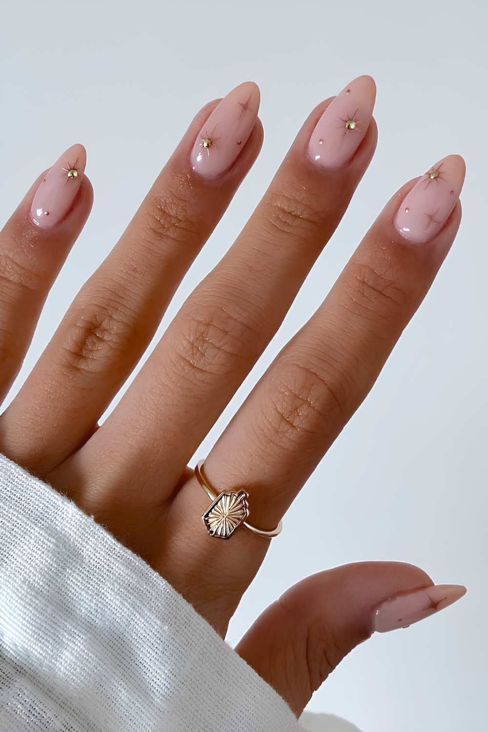 Sheer Pink With Gold Star Studs Sheer Pink With Gold Star Studs — Medium Winter Almond Nails