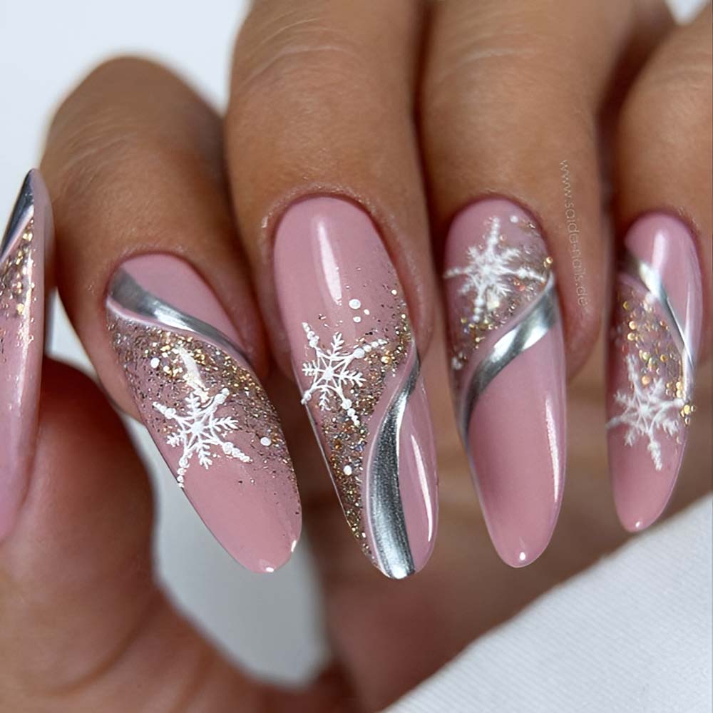 Dusty Rose Stilettos with Silver Foil and Snowflakes Dusty Rose Stilettos with Silver Foil and Snowflakes — Snowflake Nails