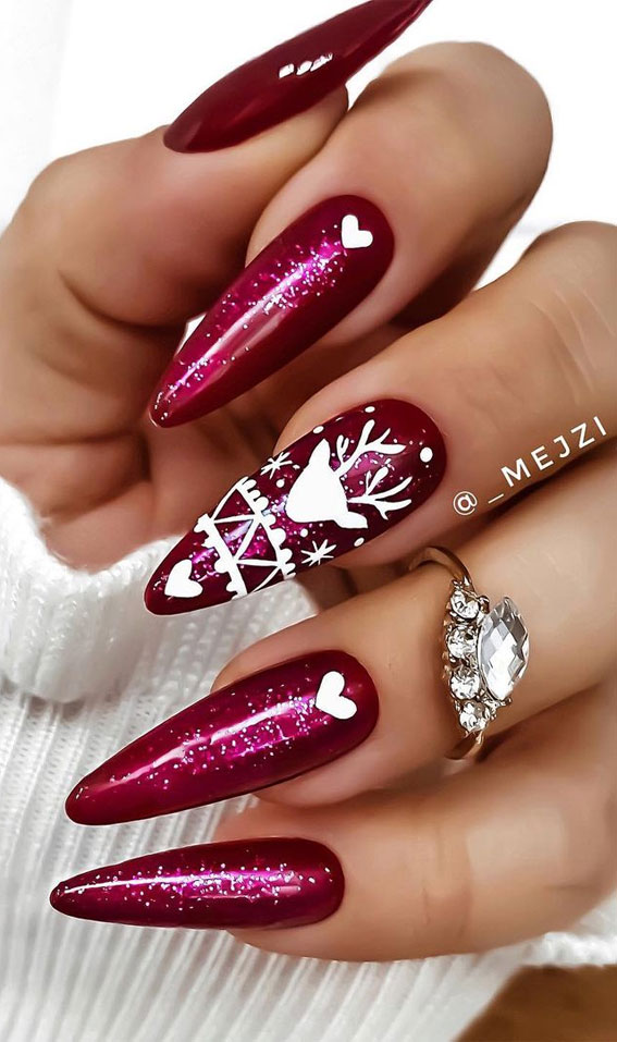 Burgundy Glitter Stilettos with Reindeer Art Burgundy Glitter Stilettos with Reindeer Art — Burgundy Christmas Nails 2026