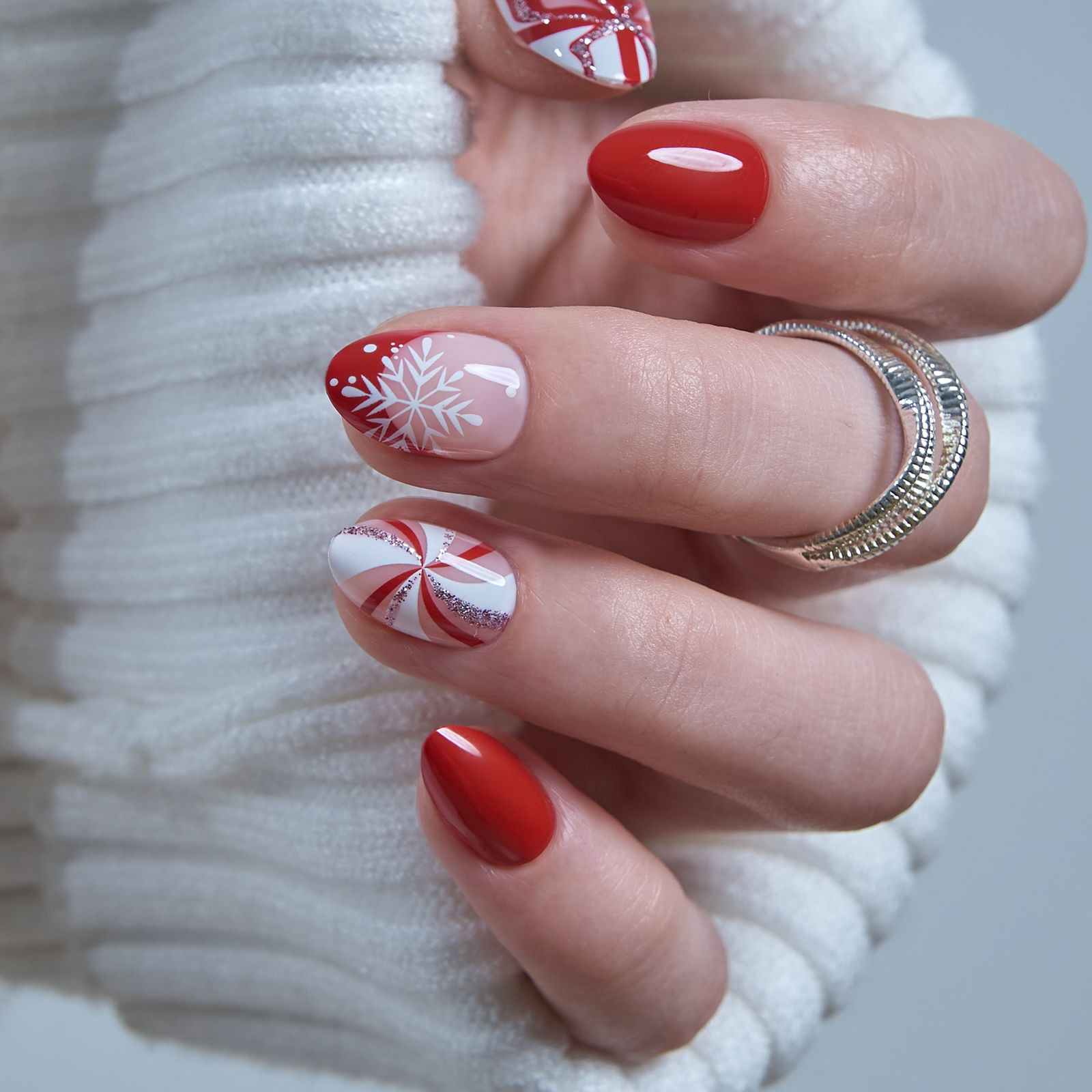 Red and White Candy Cane Almond Nails Red and White Candy Cane Almond Nails — Short Christmas Almond Nails 2026