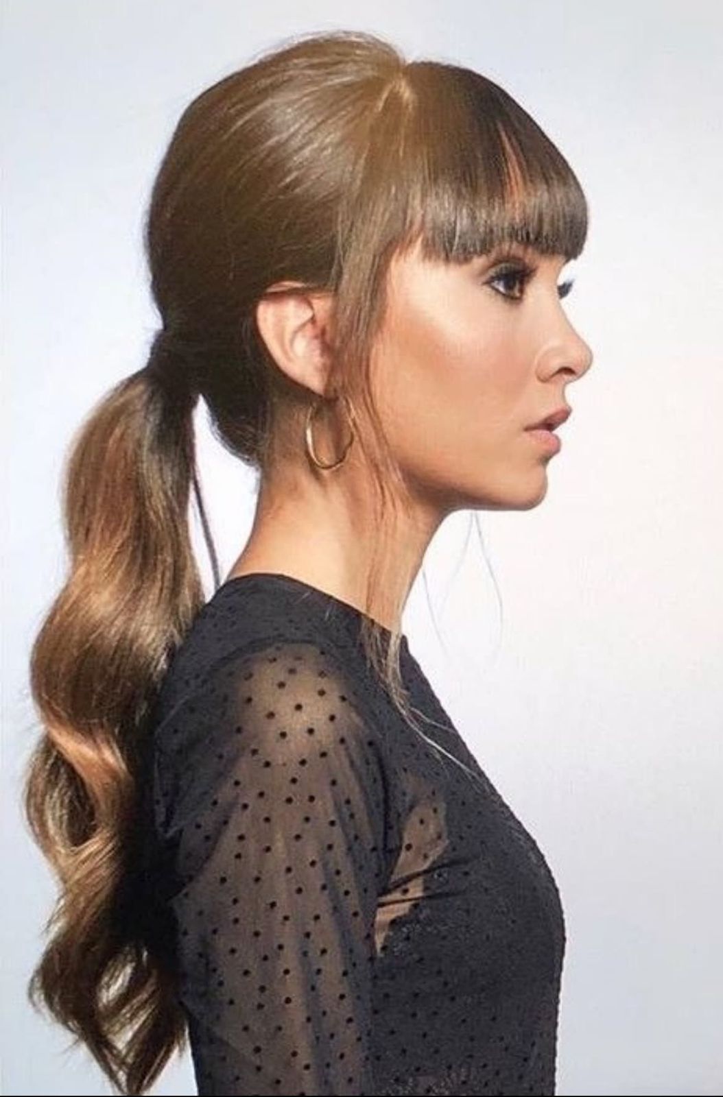 High Ponytail With Side-Swept Bangs — Winter Hairstyles with Bangs
