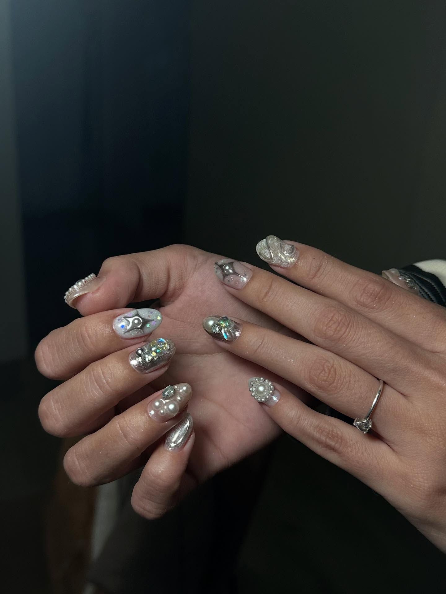 Maximalist Chrome & Glitter Stiletto Coffin Nails Maximalist Chrome & Glitter Stiletto Coffin Nails — Holiday Party Nails 2026