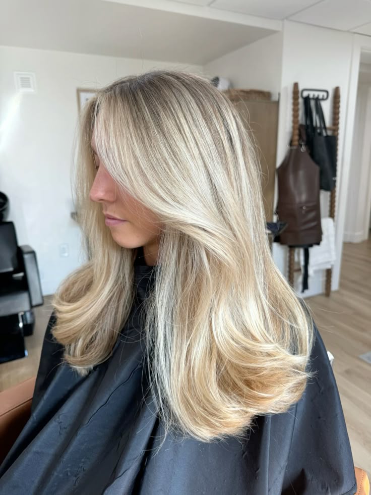 Bright Ash Blonde Voluminous Blowout Bright Ash Blonde Voluminous Blowout — Low Maintenance Winter Hair Colors