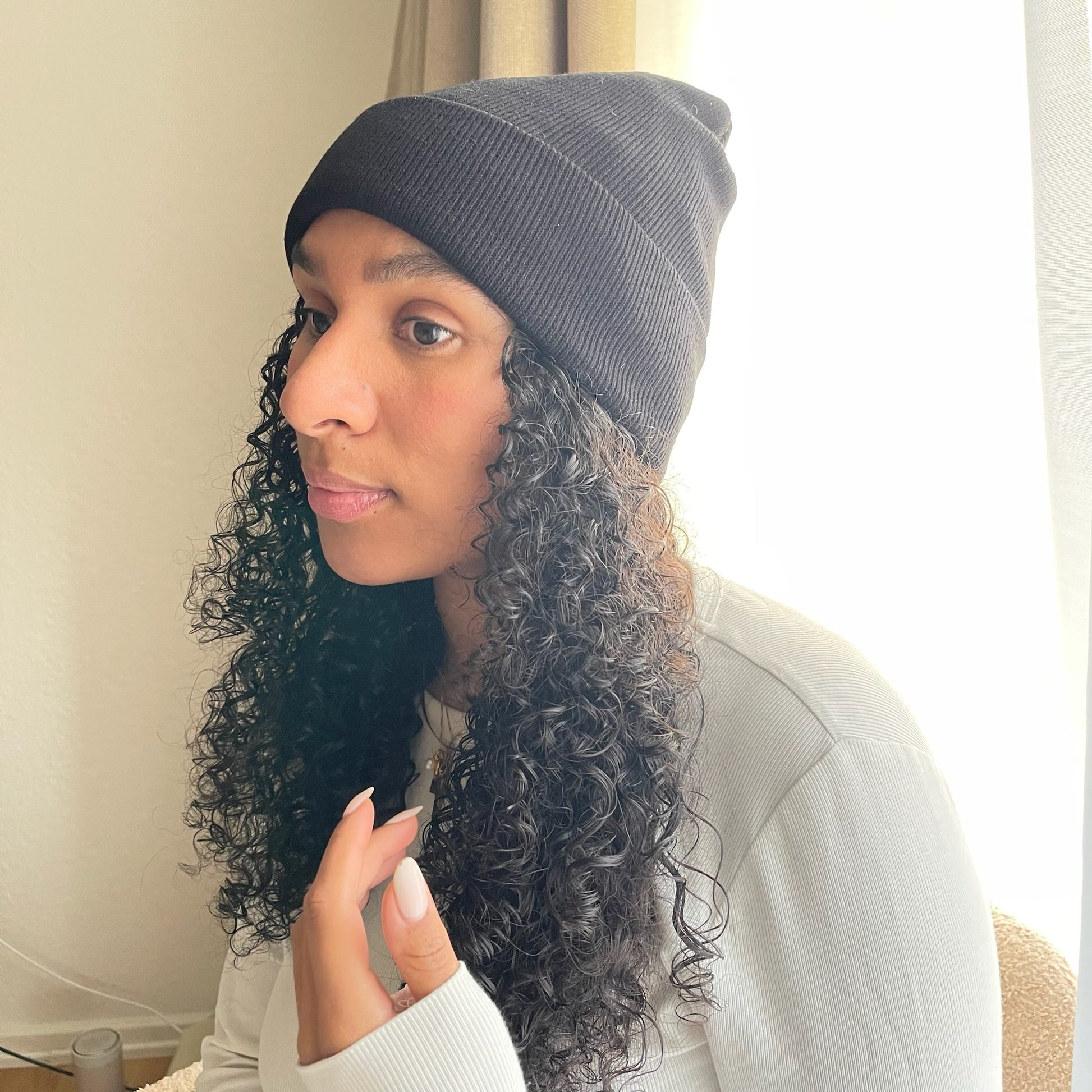 Layers Mid-Back Dark Brown Curls With Black Beanie — Winter Hat Hairstyles