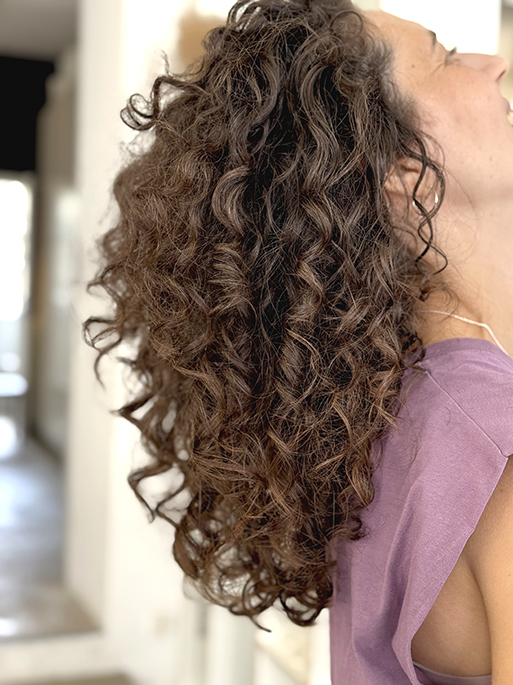 Thick Dark Brown Collarbone Side View Thick Dark Brown Collarbone Side View — Winter Haircuts for Curly Hair
