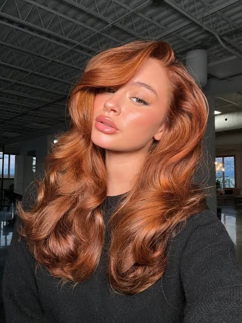 Voluminous Copper Red Blowout with Side Bangs Voluminous Copper Red Blowout with Side Bangs — Winter Hair Colors for Redheads
