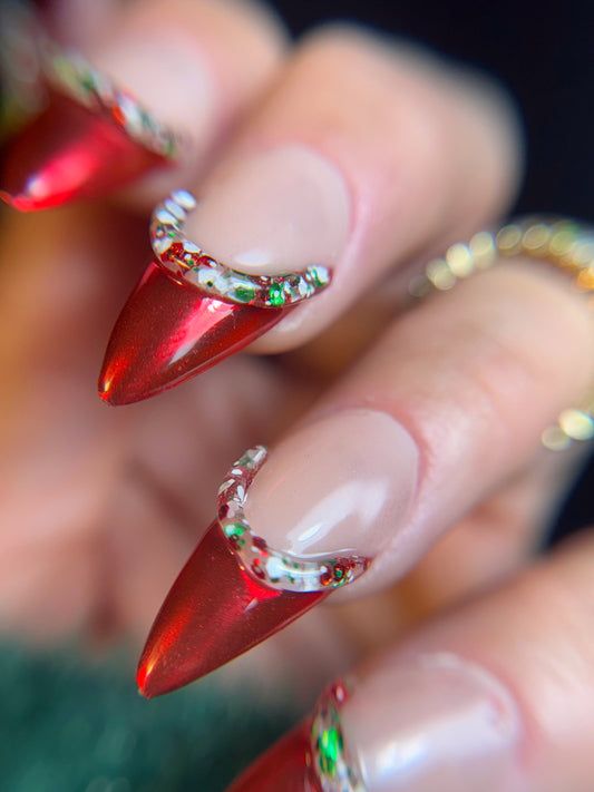 Metallic Red Stilettos with Rhinestone Cuticle Border Metallic Red Stilettos with Rhinestone Cuticle Border — Christmas Stiletto Nails 2026