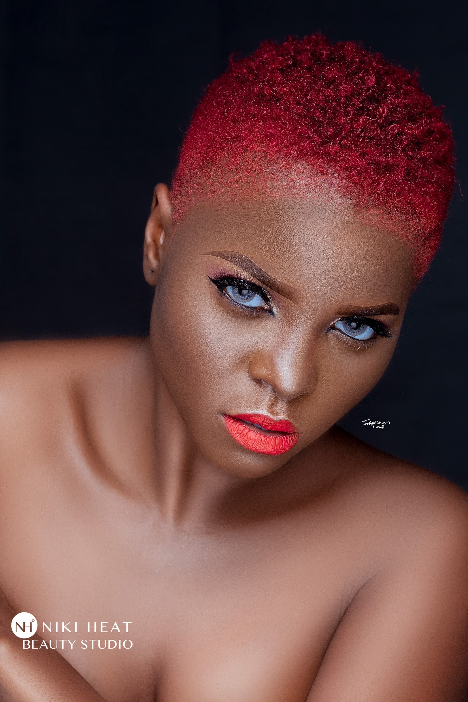 Vibrant Red Pixie With Slicked Texture Vibrant Red Pixie With Slicked Texture — Winter Haircuts for Black Women