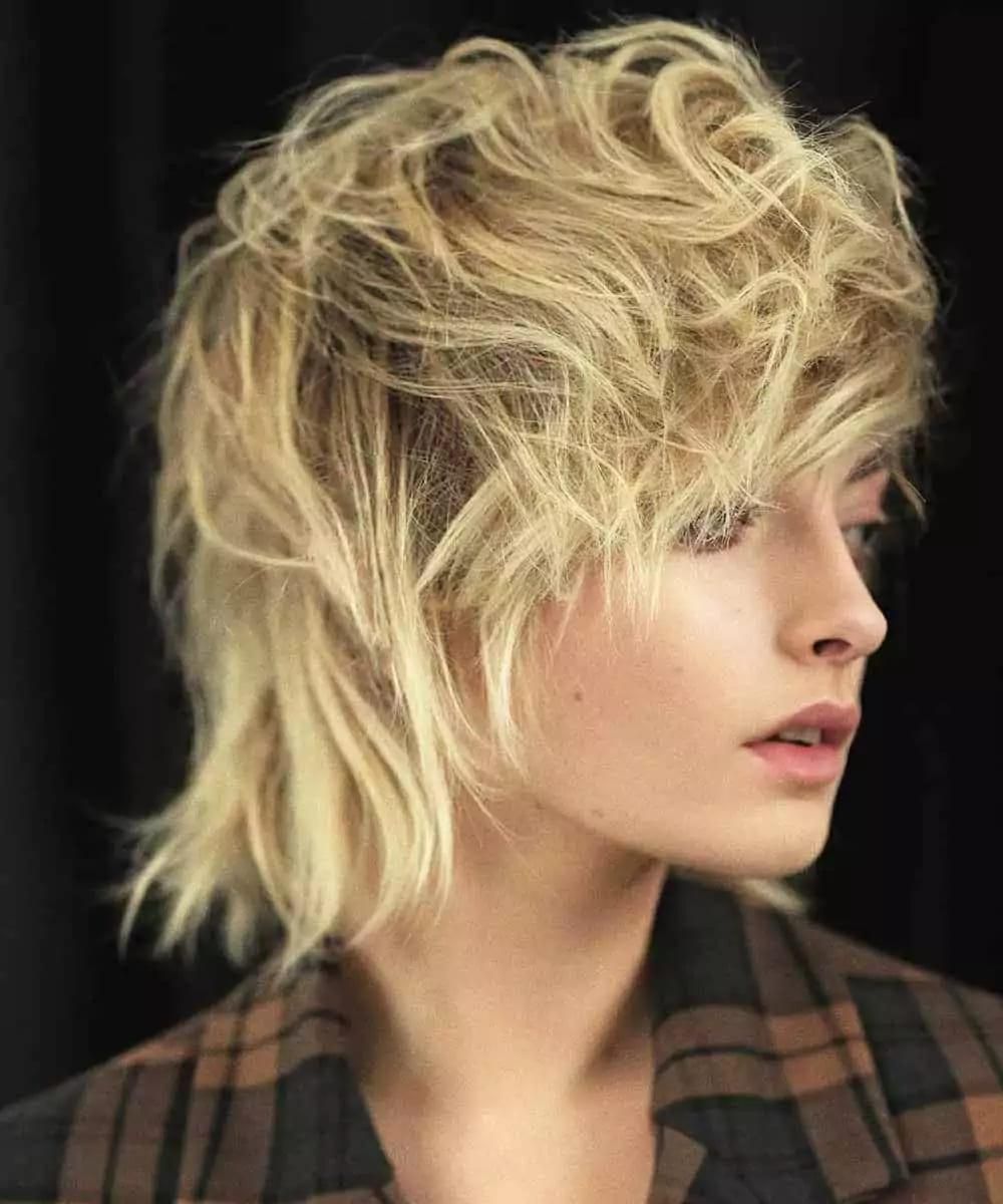Textured Ash Blonde Shag Textured Ash Blonde Shag — Winter Haircuts with Curtain Bangs