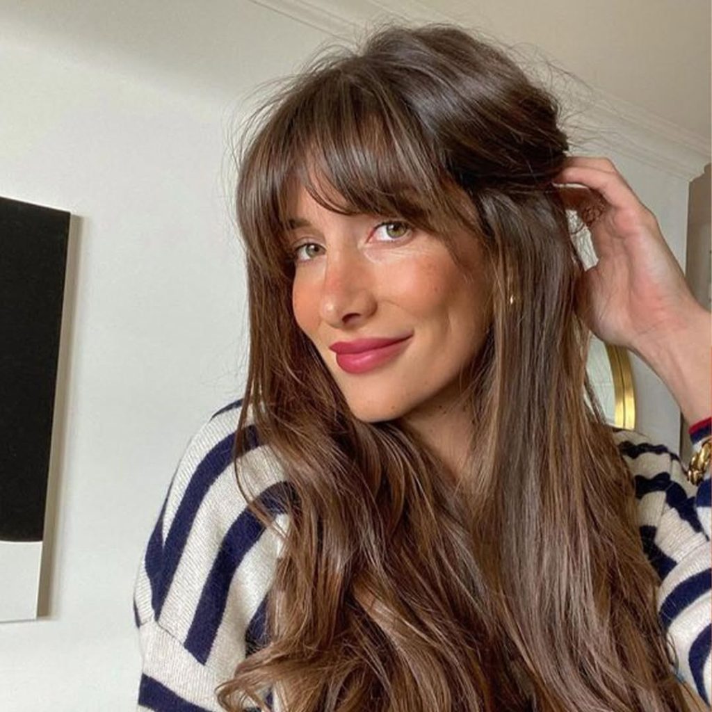 Chin-Length Layered Bob With Side Bangs Chin-Length Layered Bob With Side Bangs — Winter Haircuts for Women