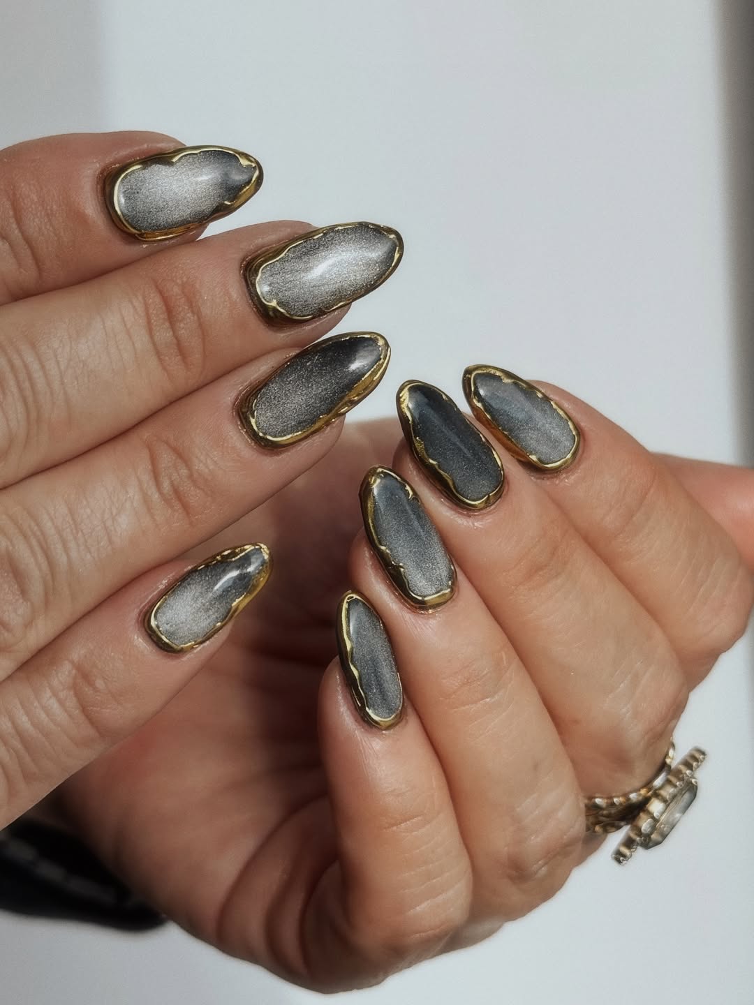 Grey Cat-Eye with Gold Outline — Classy New Years Nails 2027