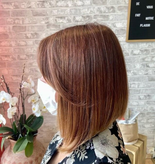 Visual Idea — A Woman With Chin-Length Visual Idea — A Woman With Chin-Length — Winter Haircuts with Curtain Bangs