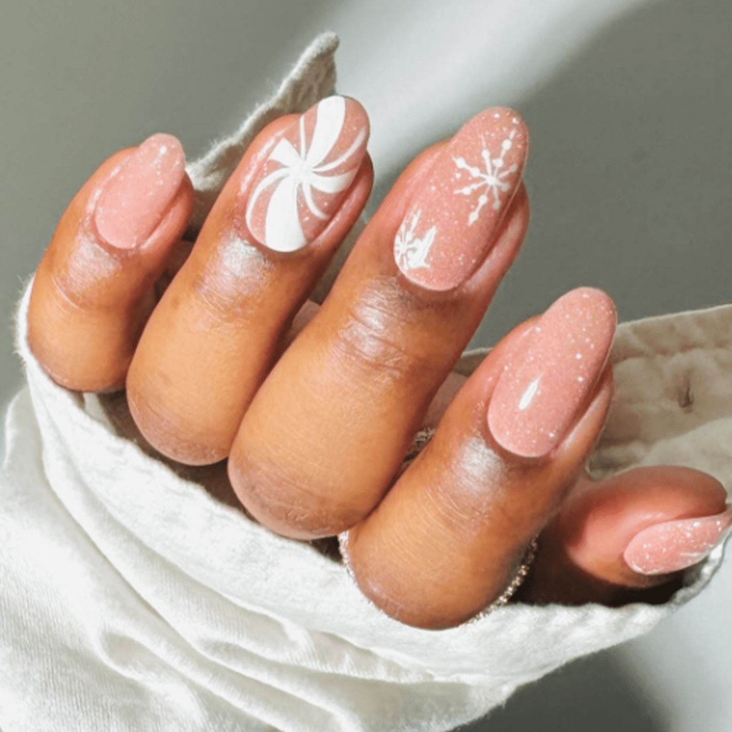 Medium Oval Peppermint Swirl and Snowflakes Medium Oval Peppermint Swirl and Snowflakes — Christmas Nails for Kids 2026