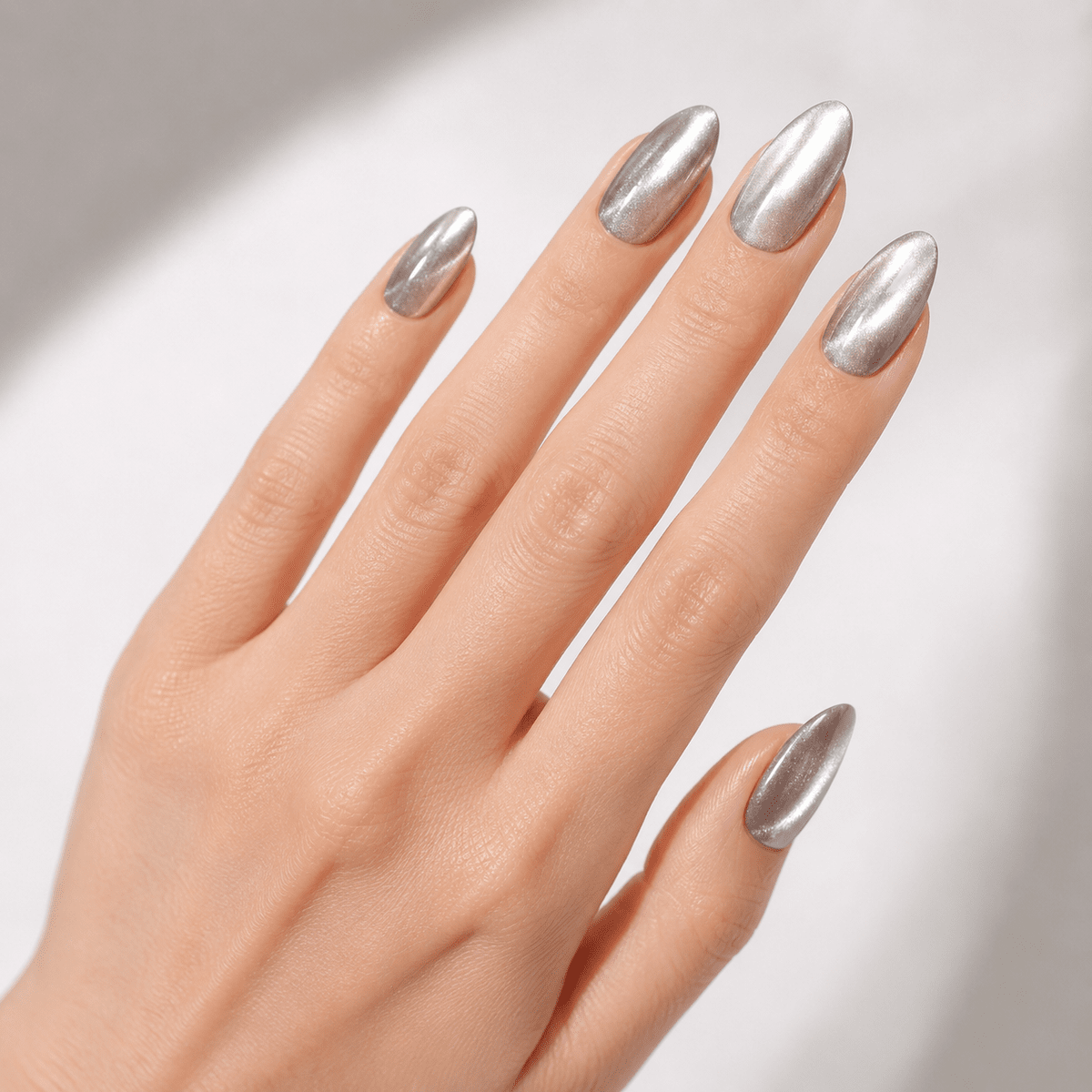 Metallic Silver Chrome Almond Nails Metallic Silver Chrome Almond Nails — Long Winter Almond Nails