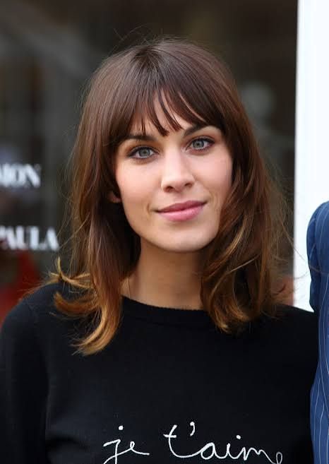 Collarbone Lob With Wispy Bangs — Winter Haircuts for Oval Faces