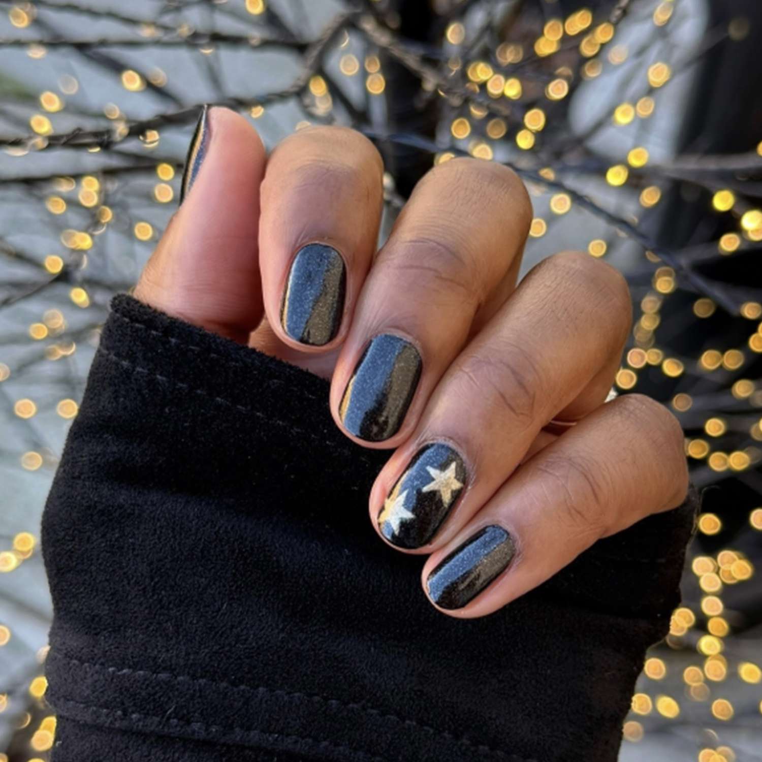 Short Oval Black with Silver Shimmer and Gold Stars Short Oval Black with Silver Shimmer and Gold Stars — New Years Nails 2027