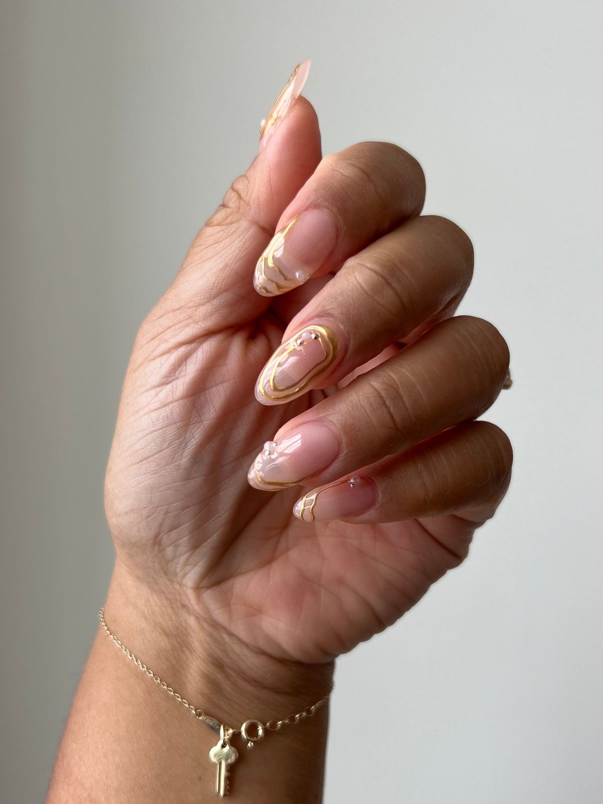 Gold Abstract Lines On All Nails Visual Idea Gold Abstract Lines On All Nails Visual Idea — Winter Wedding Guest Nails