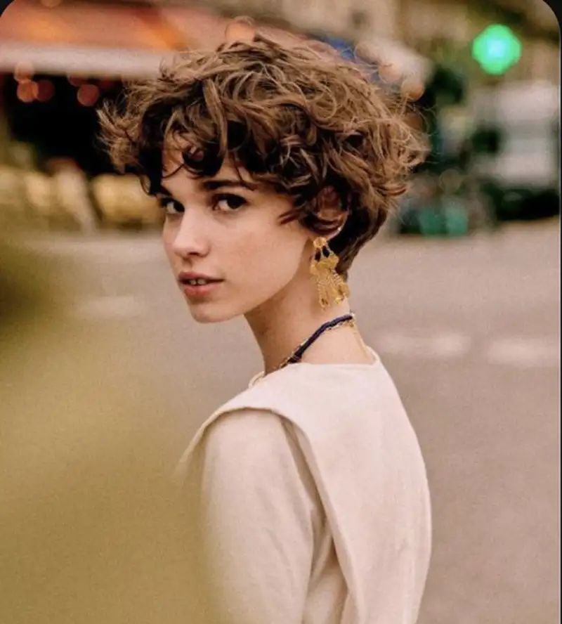 Medium Brown Textured Pixie Cut Medium Brown Textured Pixie Cut — Winter Hairstyles for Curly Hair