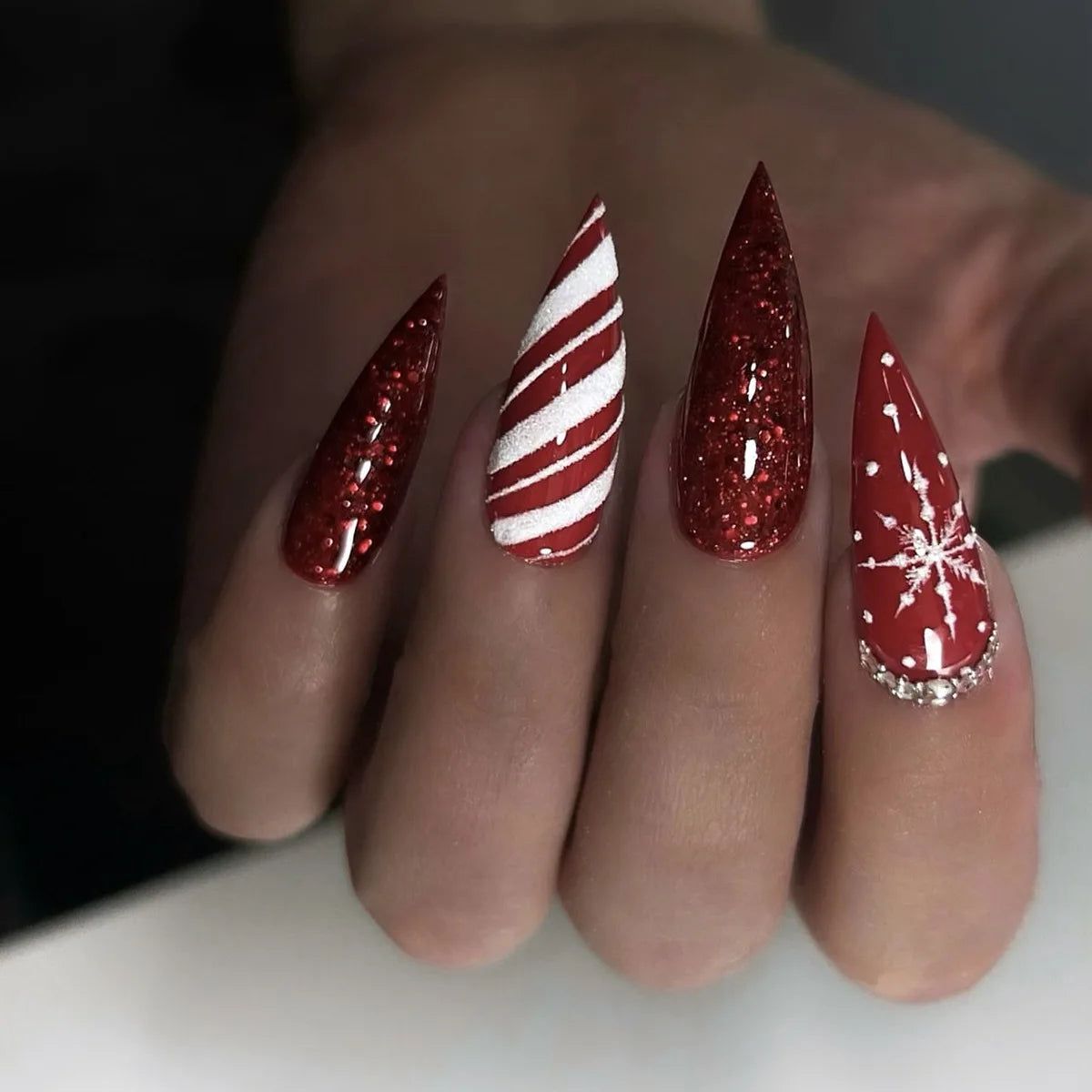 Classic Red Stilettos with Festive Art Classic Red Stilettos with Festive Art — Long Christmas Nails 2026