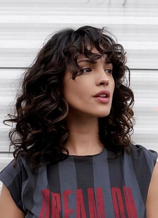 Layered Lob With Wispy Bangs Layered Lob With Wispy Bangs — Winter Hairstyles for Curly Hair