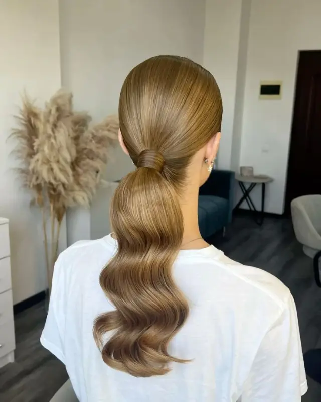 Sleek Ash Blonde High Ponytail — Winter Wedding Guest Hairstyles