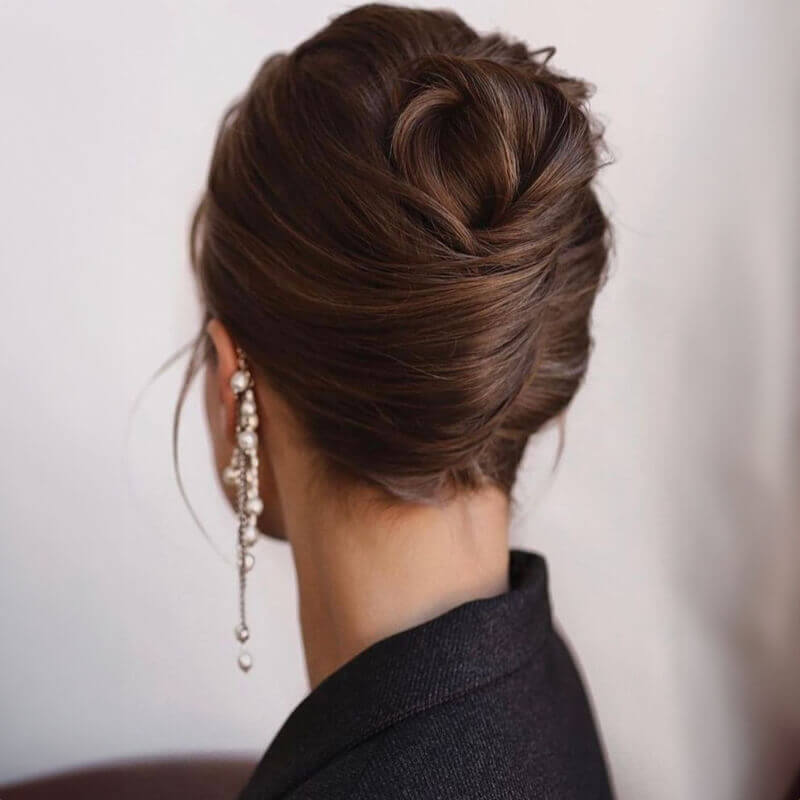 Sleek Dark Brown Chignon Sleek Dark Brown Chignon — Cute Winter Hairstyles