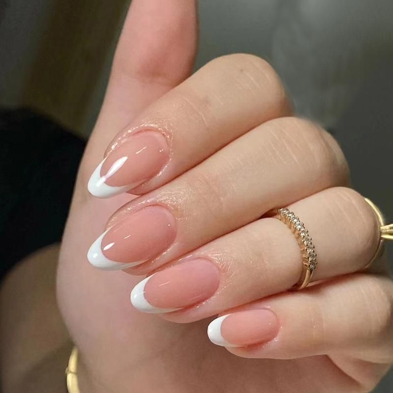 Classic Sheer Pink French Manicure Classic Sheer Pink French Manicure — Medium Winter Almond Nails