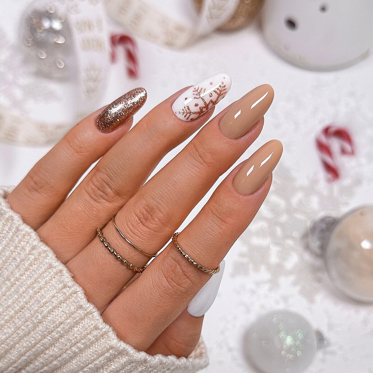Medium Oval Nude with Delicate Gold Snowflake Medium Oval Nude with Delicate Gold Snowflake — Snowflake Nails