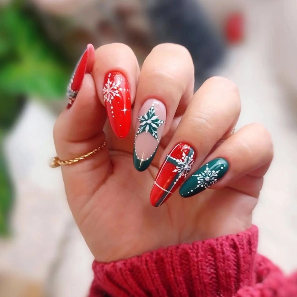 Red and Green Long Stilettos with Snowflakes Red and Green Long Stilettos with Snowflakes — Red and Green Christmas Nails 2026