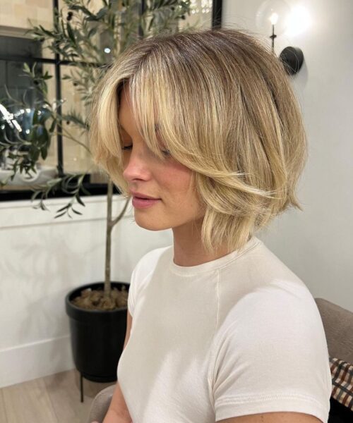 Voluminous Bob With Curtain Bangs Voluminous Bob With Curtain Bangs — Short Winter Haircuts