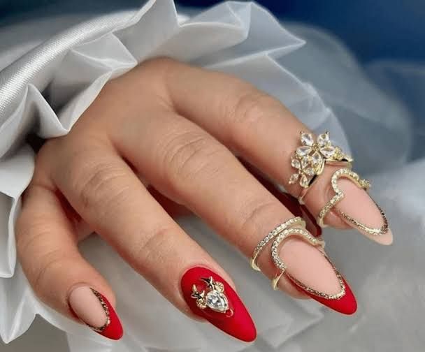 Nude Stilettos with Gold Chrome and Gems Nude Stilettos with Gold Chrome and Gems — Christmas Stiletto Nails 2026