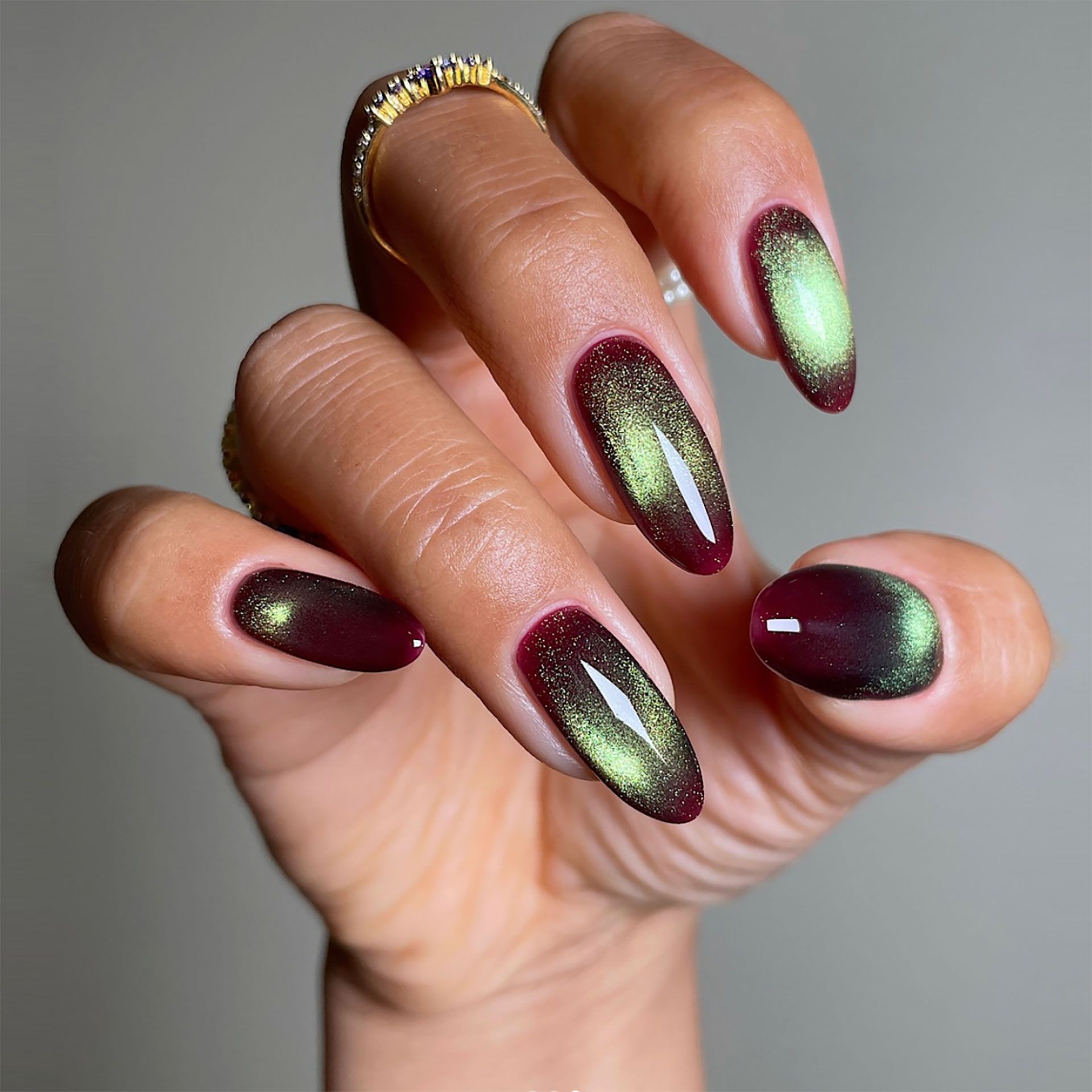 Burgundy Magnetic Cat Eye Almond Nails Burgundy Magnetic Cat Eye Almond Nails — New Years Nails 2027