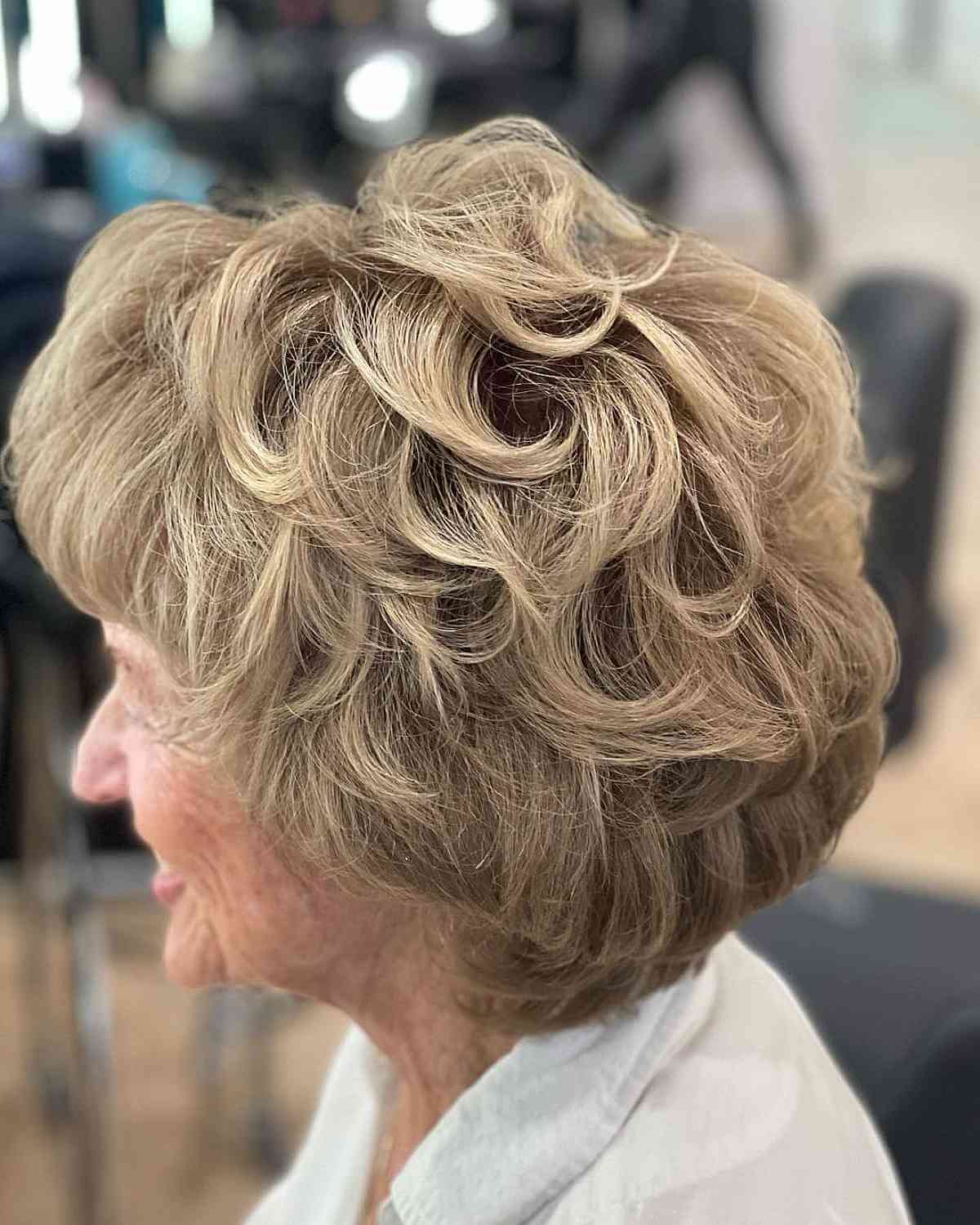 Layered Bob Ash Blonde Bob with Silver Tones Layered Bob Ash Blonde Bob with Silver Tones — Winter Hair Colors for Women Over 70