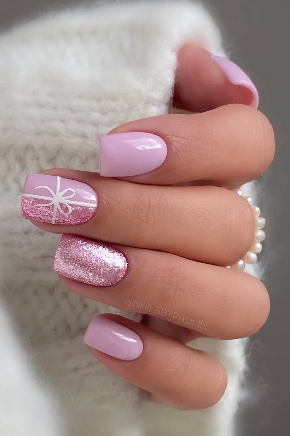 Sweet Pink Glitter Bow Short Square Nails Sweet Pink Glitter Bow Short Square Nails — Christmas Nail Trends 2026