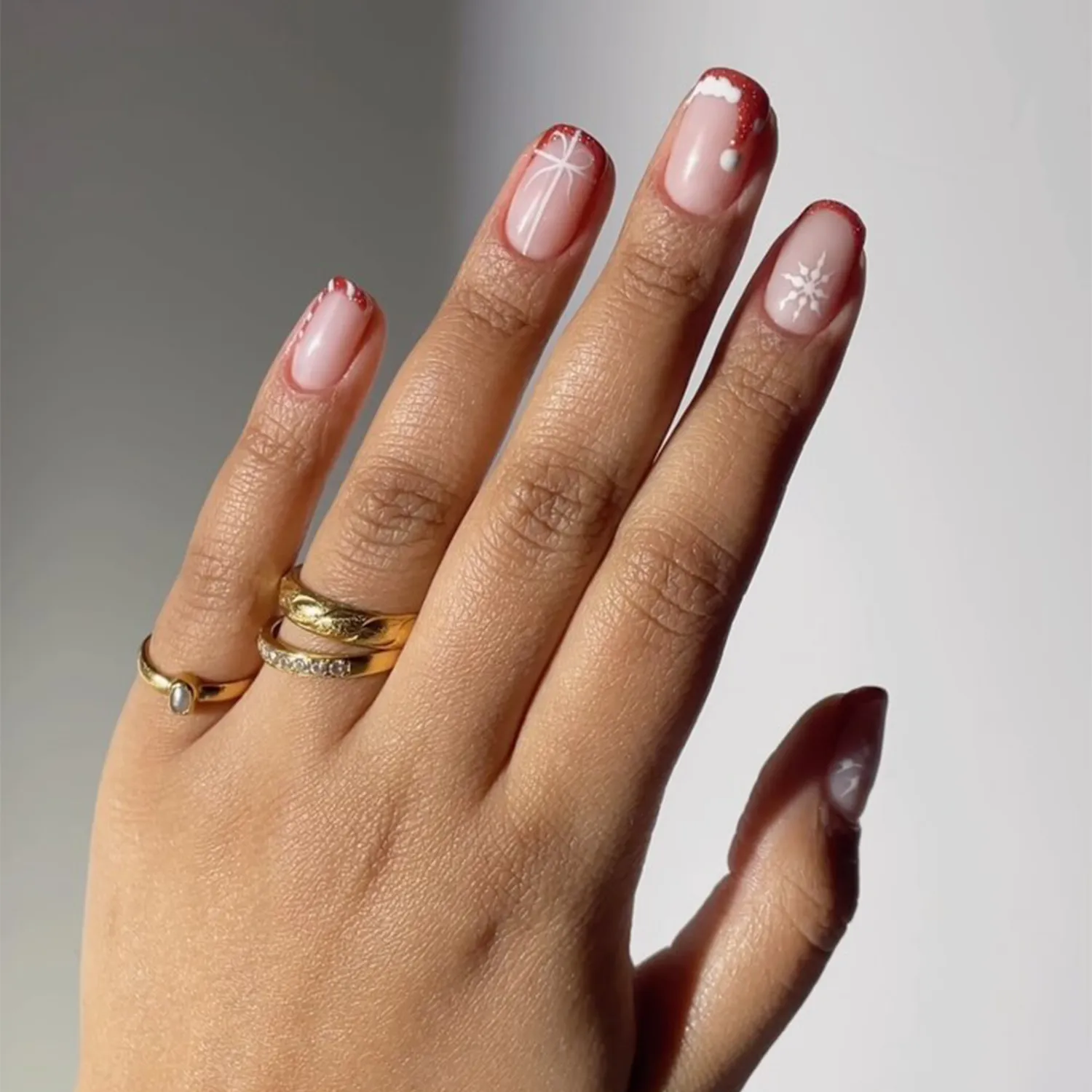 Deep Red Cat-Eye with Festive Green Christmas Tree Deep Red Cat-Eye with Festive Green Christmas Tree — Red and Gold Christmas Nails 2026