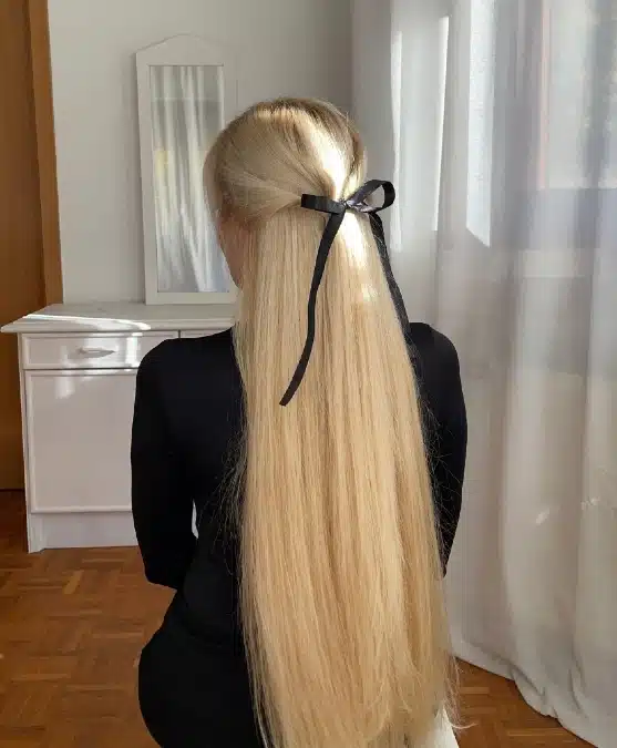 Low Ponytail With Black Ribbon — Winter Hairstyles for Work