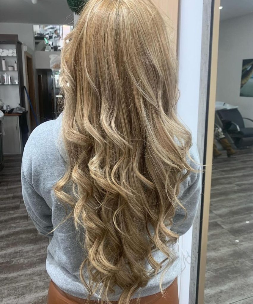 Mid-Back Ash Blonde with Subtle Highlights Mid-Back Ash Blonde with Subtle Highlights — Winter Hair Colors for Women Over 70