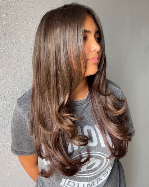Layered Long Bob with Side-Swept Bangs Layered Long Bob with Side-Swept Bangs — Winter Haircuts for Thick Hair