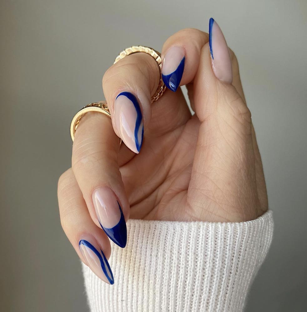 Abstract Wavy Blue French Almond Nails Abstract Wavy Blue French Almond Nails — Long Winter Almond Nails