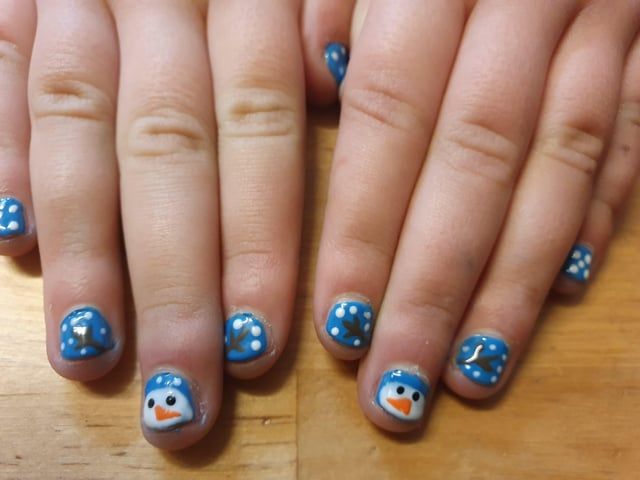 Blue Snowman Face Nails Blue Snowman Face Nails — Christmas Nails for Kids 2026