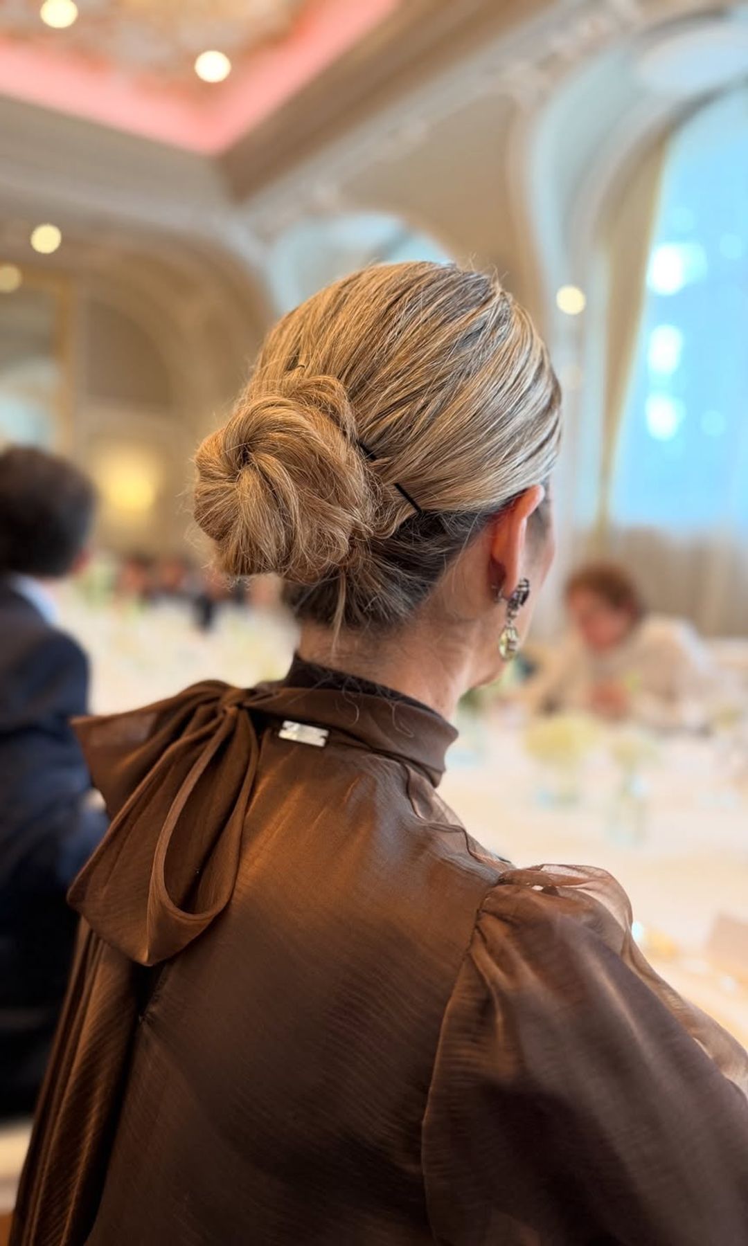 Neat Blonde Low Bun — Winter Wedding Guest Hairstyles