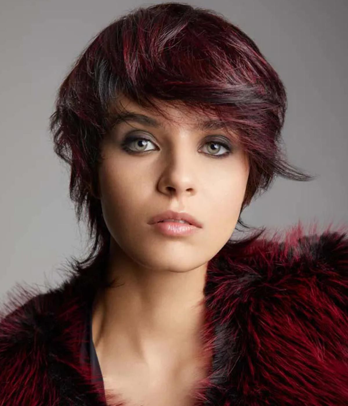 Dark Red Shaggy Bob Dark Red Shaggy Bob — Winter Haircuts for Heart Shaped Faces
