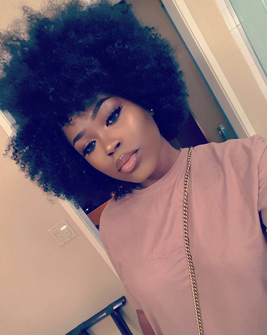 Voluminous Black Afro Voluminous Black Afro — Winter Haircuts for Black Women