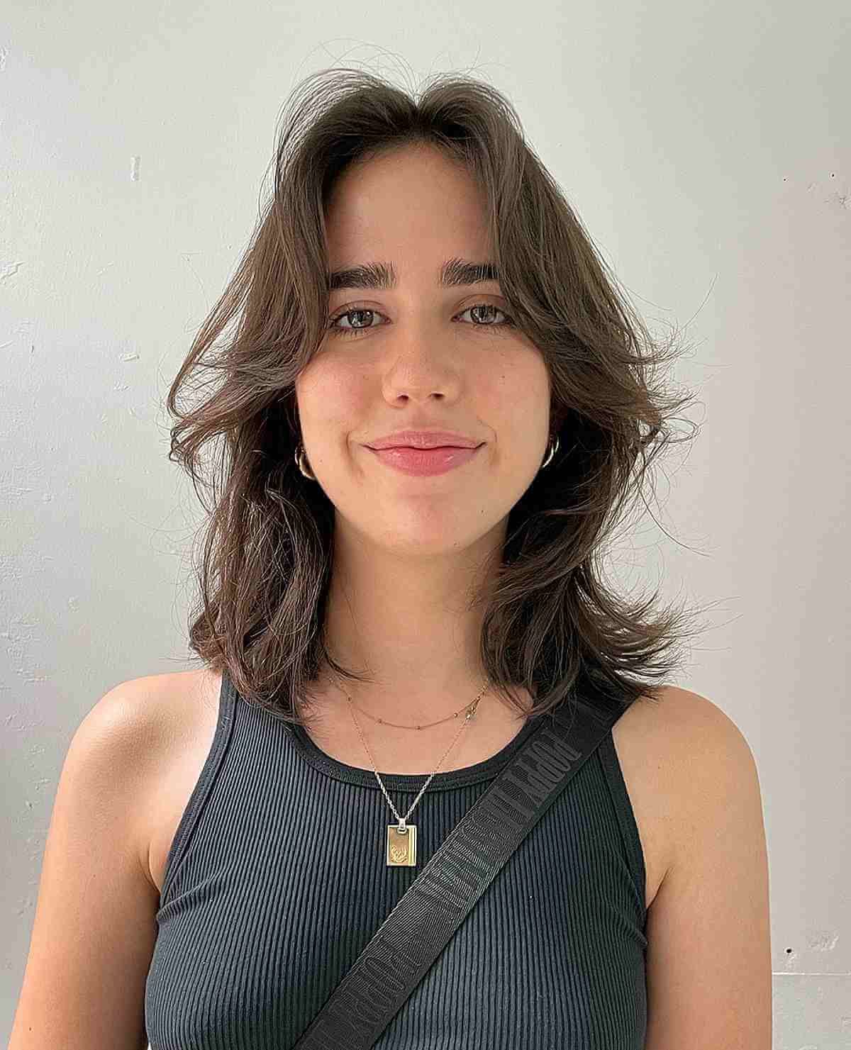 Dark Brown Shag With Full Bangs — Winter Haircuts for Oval Faces